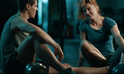 two people stretching