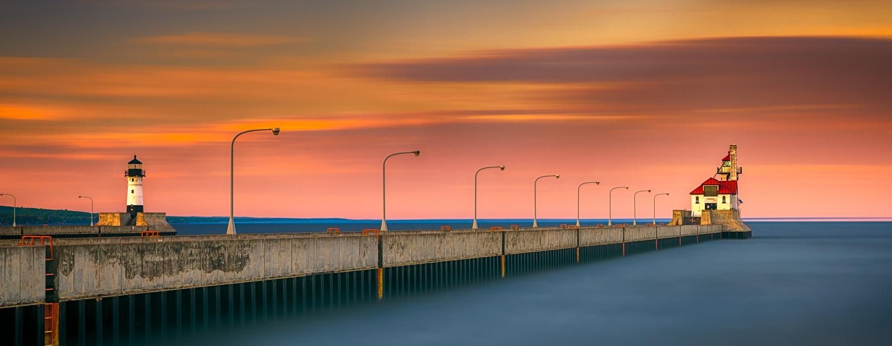 a lighthouse on a pier