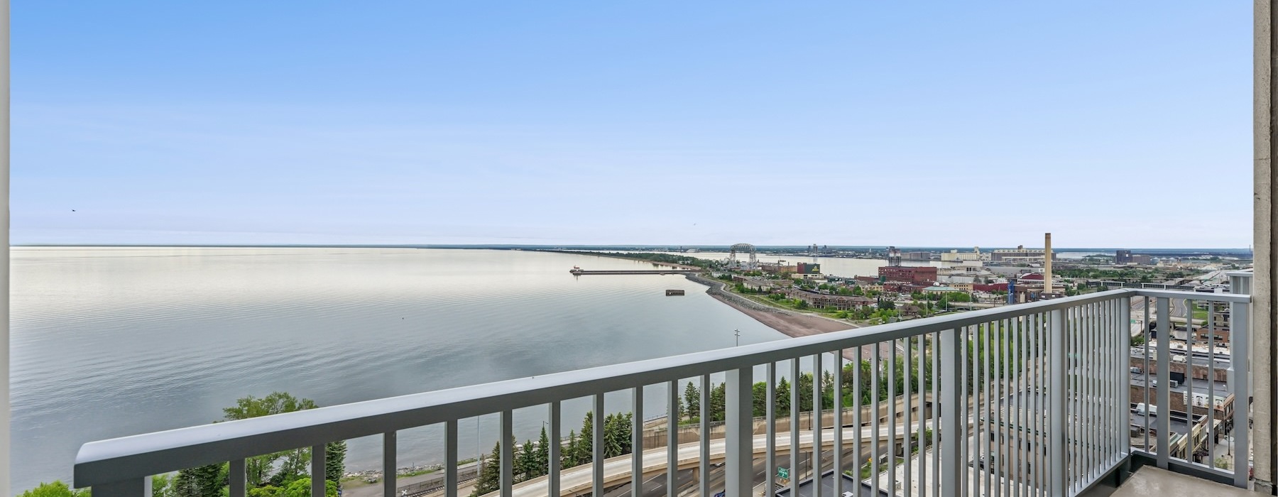 a balcony view of a shoreline